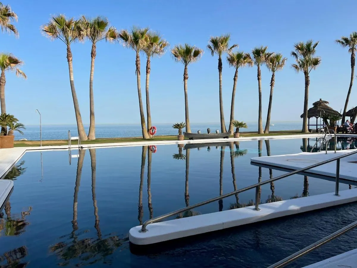 Villa La Perla: Seaside Retreat with Golf Access Sotogrande